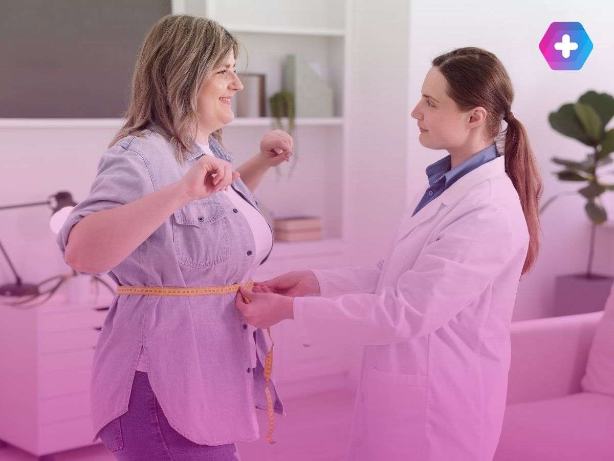 woman being measured by doctor