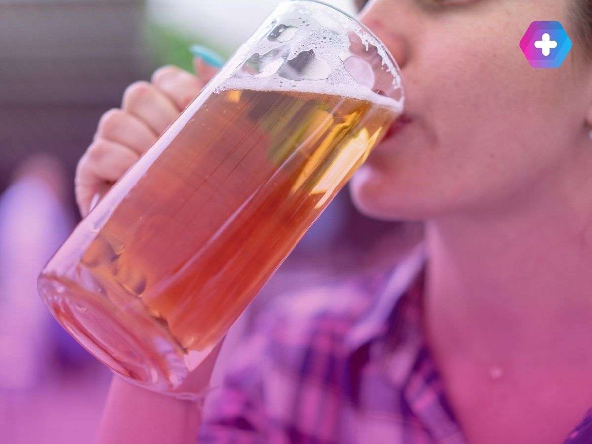 person drinking beer