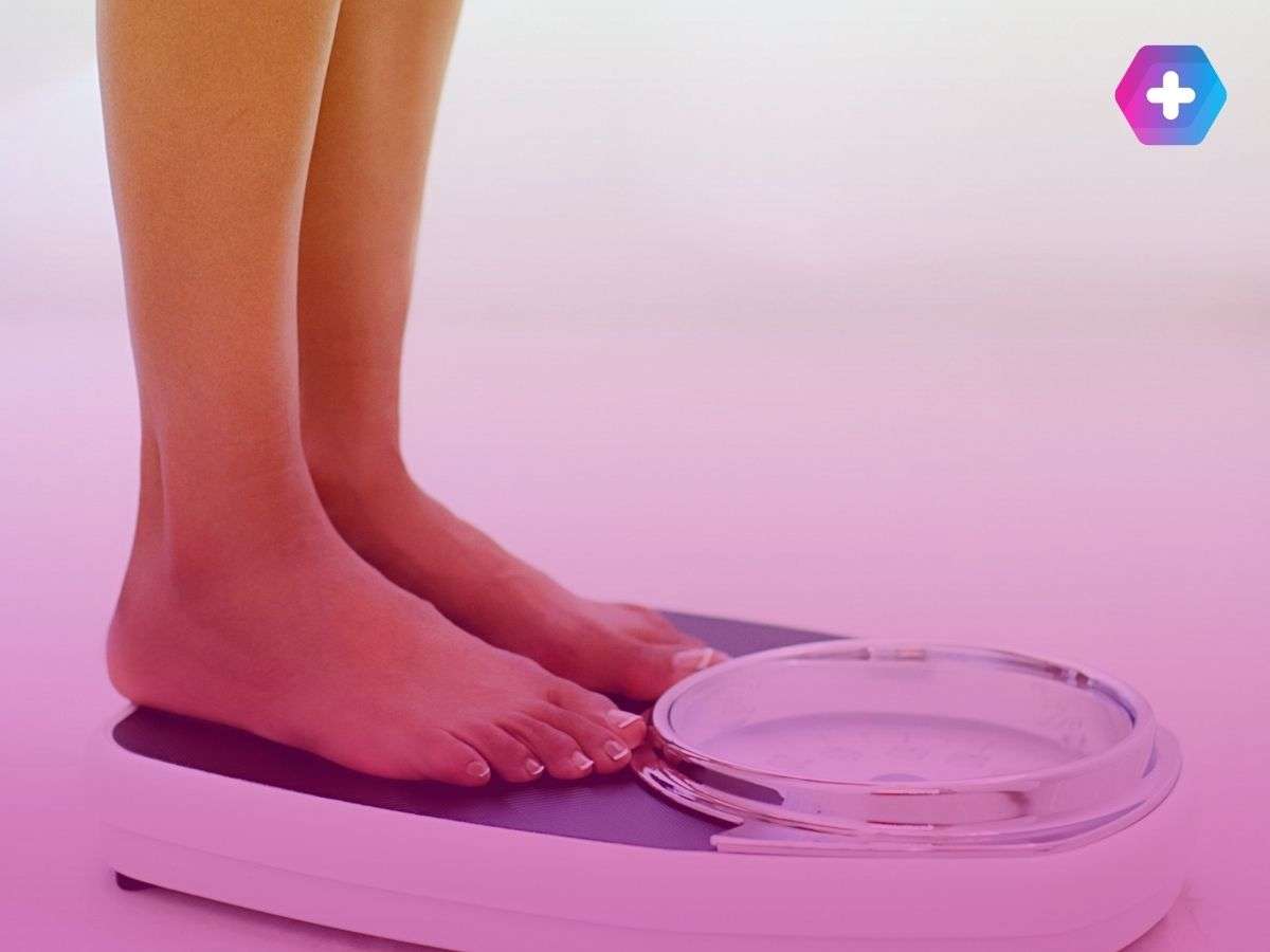 person standing on scales