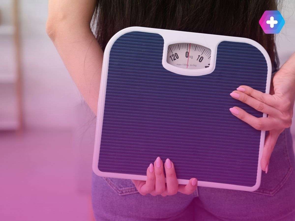 person holding blue scales