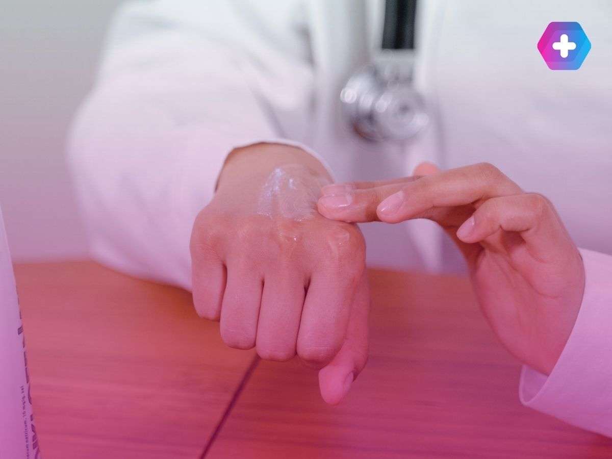 doctor demonstrating how to use cream for eczema