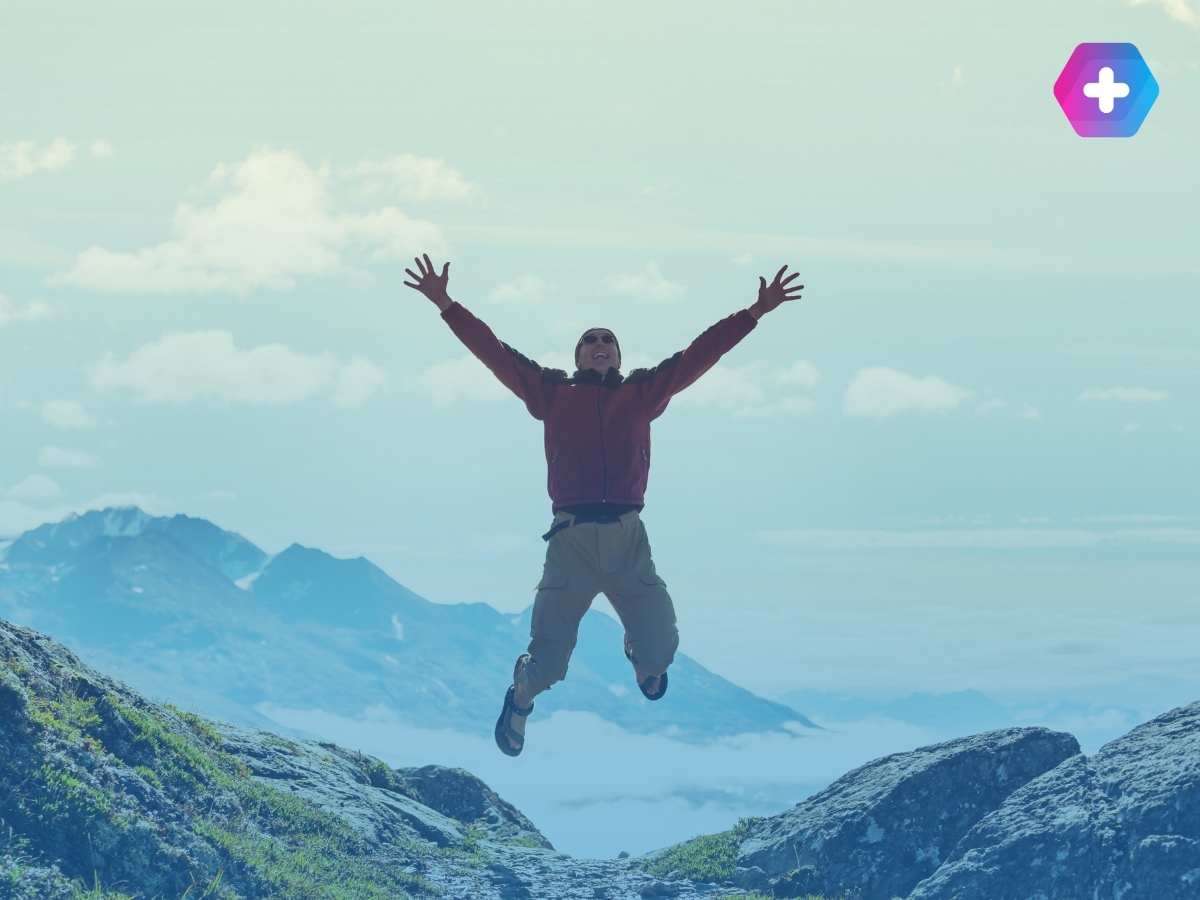 Happy man jumping, representing men's health success
