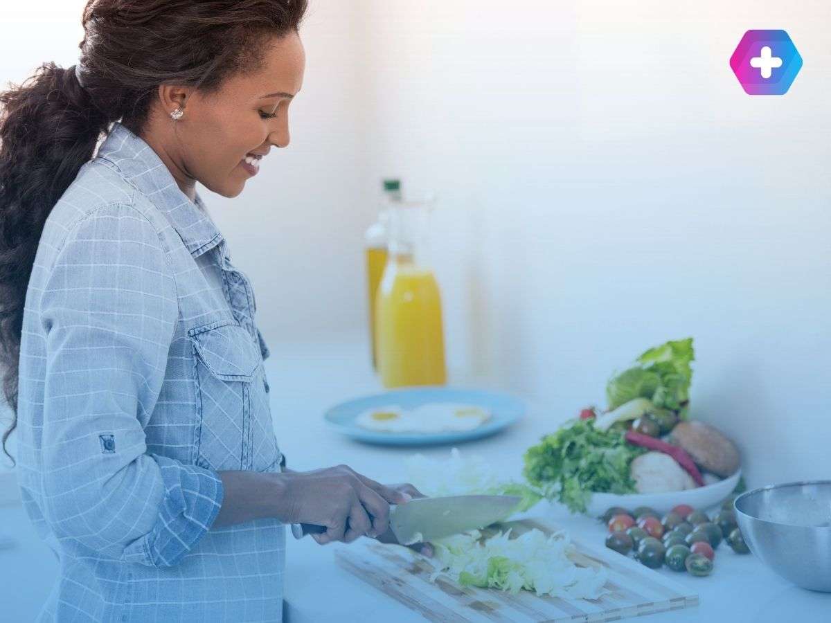 Woman cooking health food for weight loss