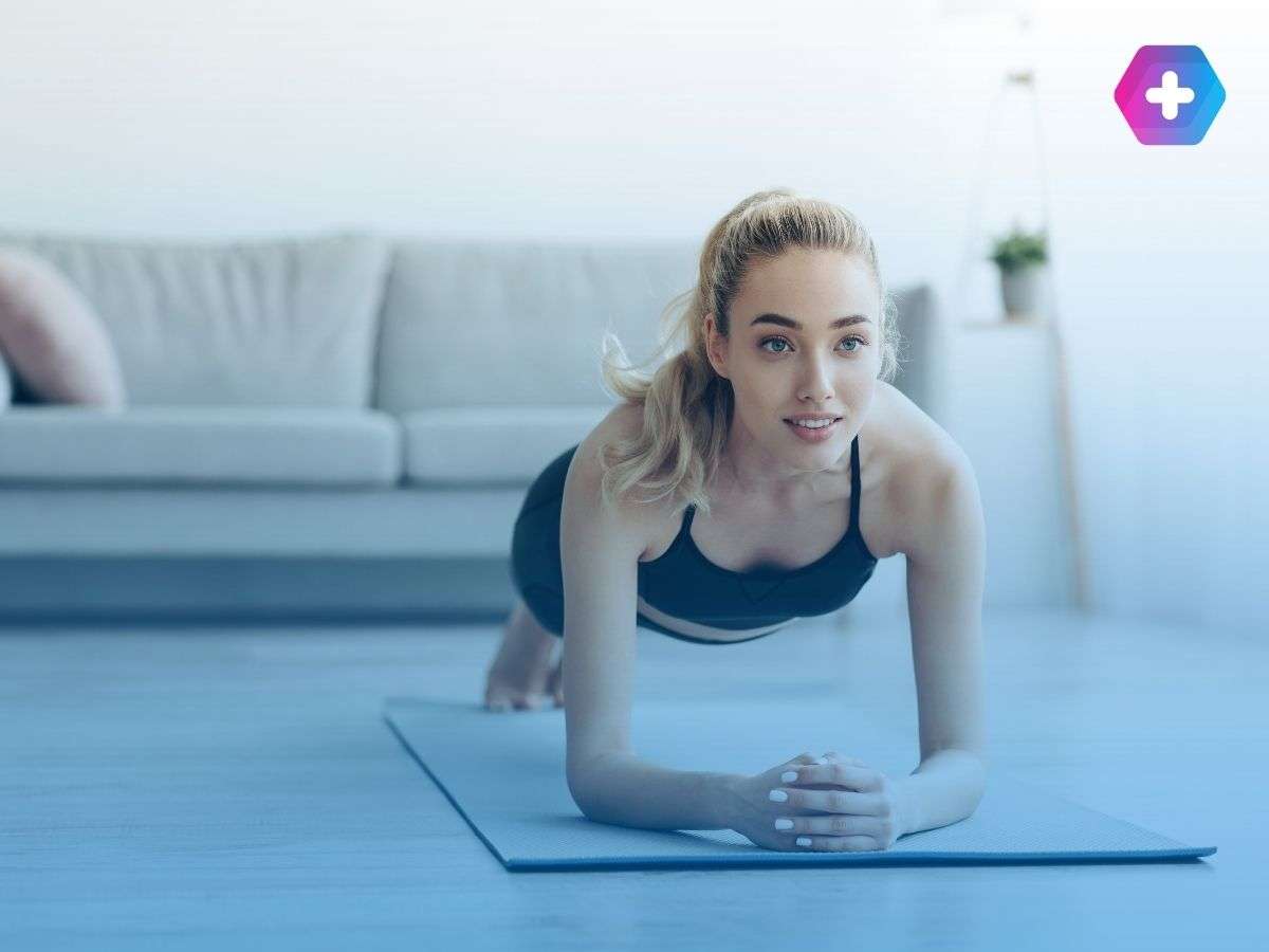 Woman doing a plank to support exercise and weight loss