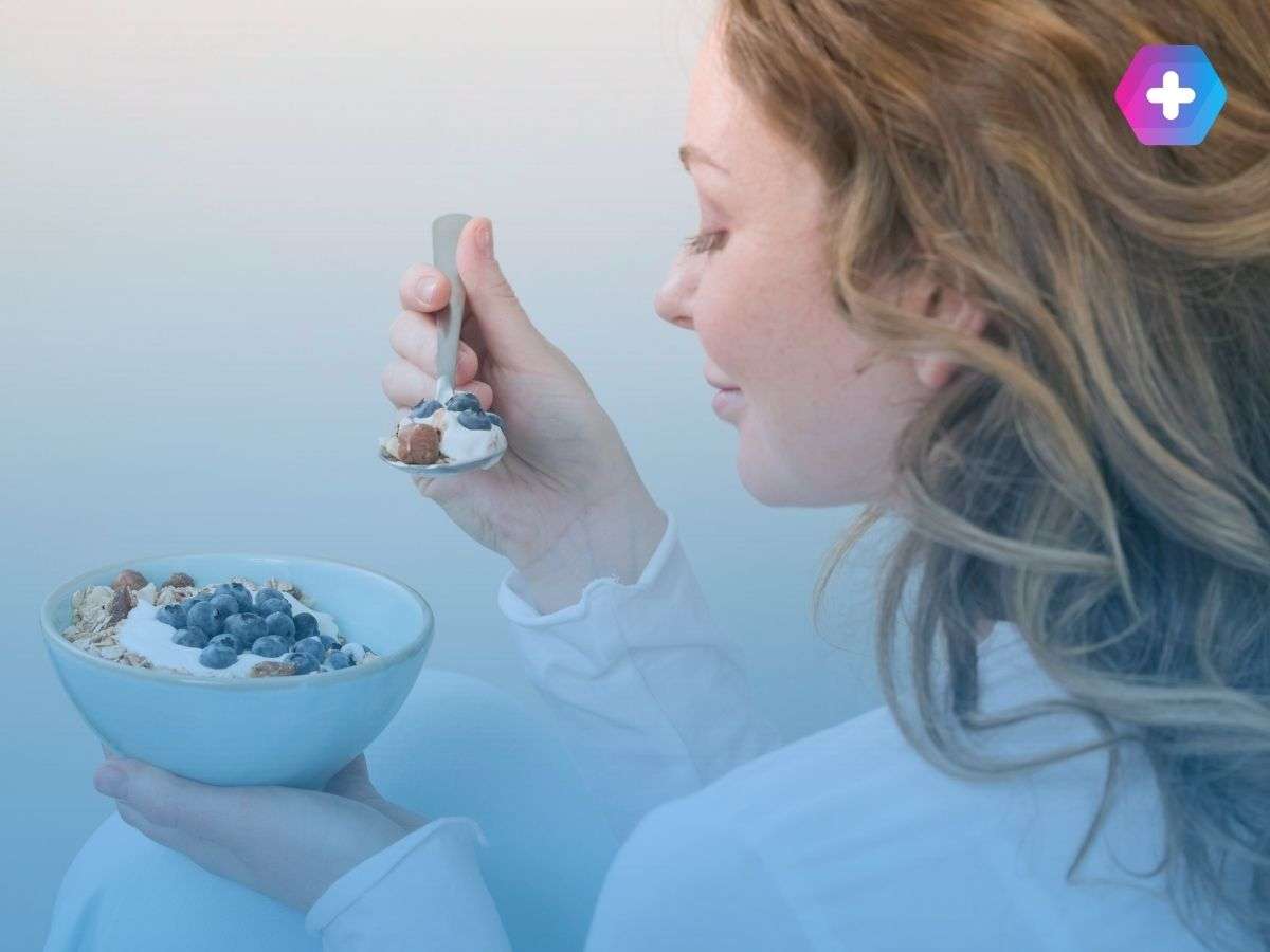 Woman eating healthy breakfast food to support weight loss